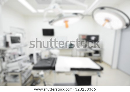 Blur of equipment and medical devices in modern operating room  take with selective color technique and art lighting