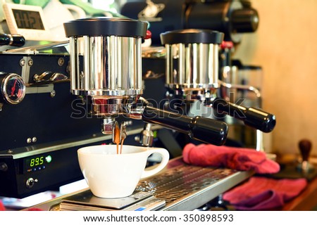 coffee machine preparing cup of coffee.