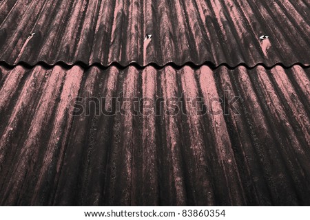 Texture of an old dirty tile roof