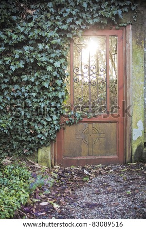 Evening light coming through a doorway in another area of garden at Auchincruive Estate in Ayrshire, Scotland, UK.