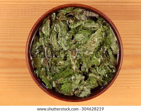 mint leaves, dried are used for making tea in a bowl, medicinal plant