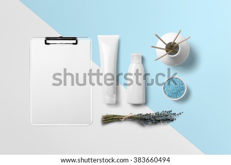 Cosmetics SPA branding mock-up, top view on white and blue background, place your design