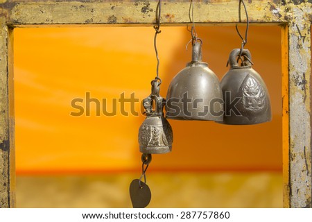 Many brass bell in Thai temple, The Bell Jar resonate in the temple.