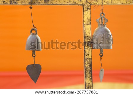 Many brass bell in Thai temple, The Bell Jar resonate in the temple.