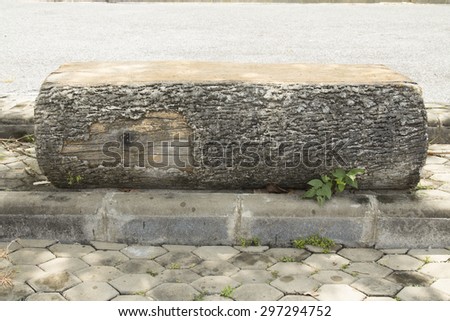 Bench made of old railroad ties isolated on white background, cut down trees to make seat, deforestation.