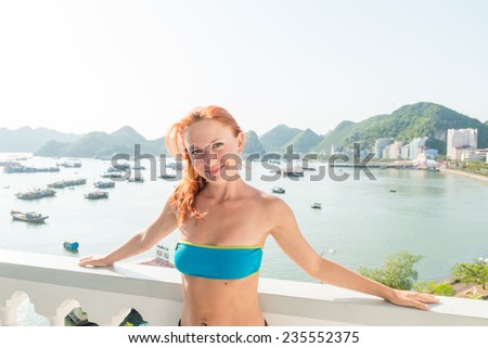 Tourist enjoying Halong cruise with daily trips to local sights