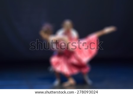 Contemporary dance performance blur background with shallow depth of field bokeh effect