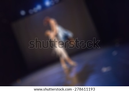 Contemporary dance performance blur background with shallow depth of field bokeh effect