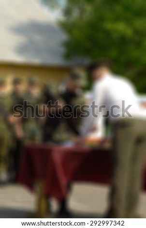 Russian army theme with armed soldiers blur background with bokeh