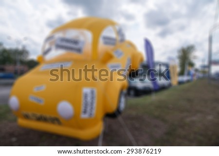 Car auto dealership themed blur background with bokeh effect