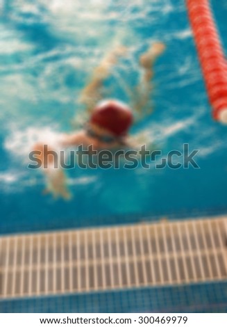 Swimming competition at fitness centre theme creative abstract blur background with bokeh effect