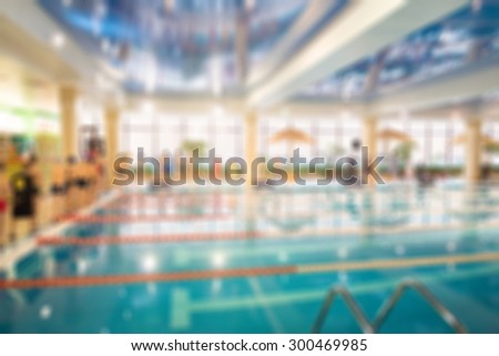 Swimming competition at fitness centre theme creative abstract blur background with bokeh effect