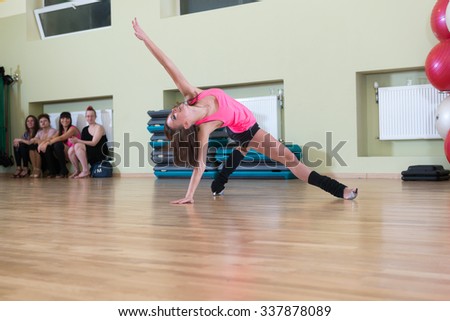 MOSCOW, RUSSIA - November 18, 2012 - Dance class for women at fitness centre local gym