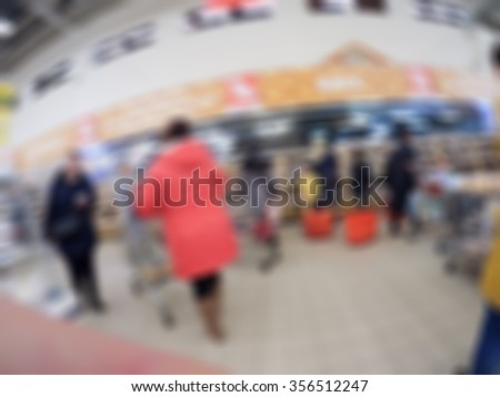 People shopping in department store theme creative abstract blur background with bokeh effect