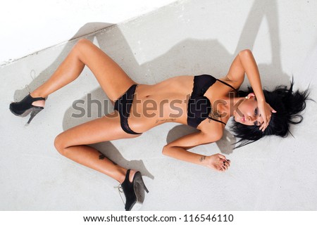 Passionate woman laying on the floor