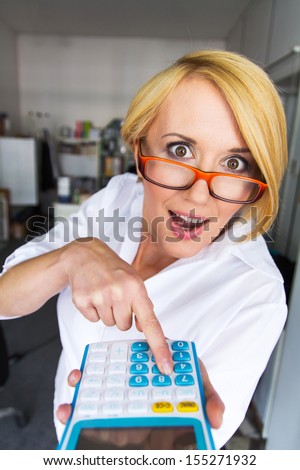Happy business woman accountant shocked, office