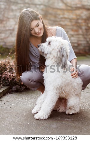 Happy woman with dog, outdoor