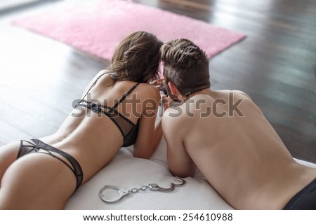 Sexy couple post selfie at home, bdsm