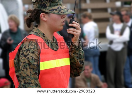 Military unit member providing surveillance