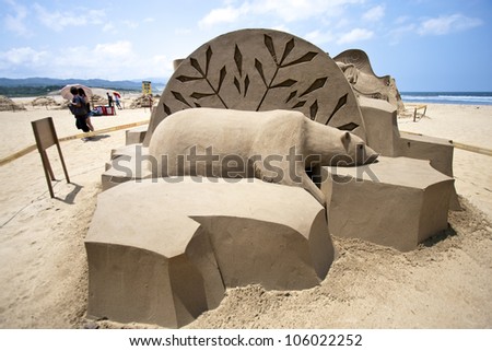 FULONG, TAIWAN-MAY 23,2012:a polar bear sand sculpture at Fulong beach for celebrating the Sand Sculpture Festival on May 23,2012 in Fulong,Taiwan