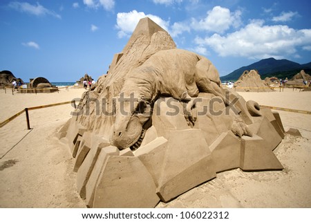 FULONG, TAIWAN-MAY 23,2012:a dinosaur sand sculpture at Fulong beach for celebrating the Sand Sculpture Festival on May 23,2012 in Fulong,Taiwan