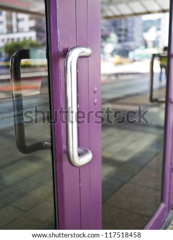 stainless modern door knob in urban