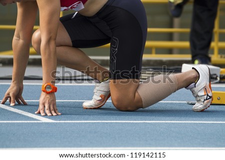 TAIPEI,TAIWAN -NOVEMBER 4: A 400m woman athlete in 17th Asia Master Athletics Championships in Taipei stadium on November 4,2012 in Taipei,Taiwan