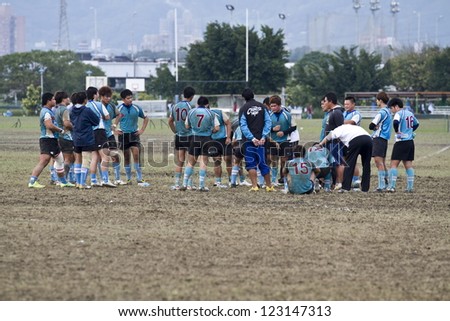 TAIPEI,TAIWAN - DEC 13 : unidentified college players of chang jung and Physical Education in the All-Taiwan rugby Competition in Taipei Bailing Rugby Fields on December 13,2012 in Taipei,Taiwan