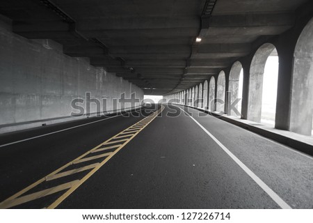 view of road tunnel along seaside,Taiwan