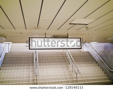 blank billboard in metro station