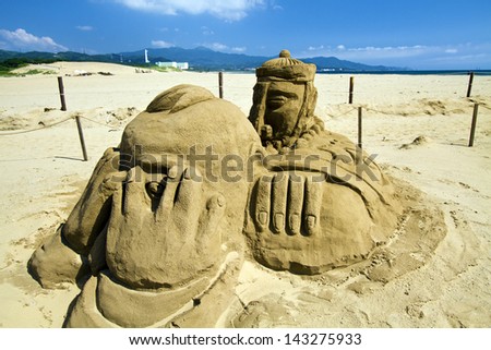 FULONG, TAIWAN-JUNE 19,2013:a novel sand sculpture at Fulong beach for celebrating the Sand Sculpture Festival on JUNE 19,2013 in Fulong,Taiwan