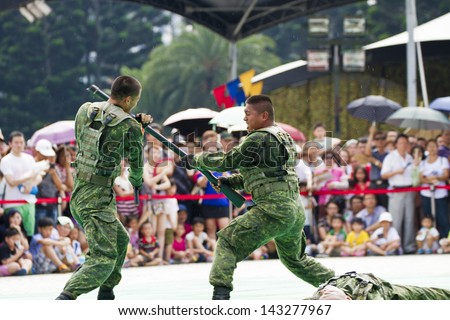 TAIPEI, TAIWAN-JUNE 16,2013:Taiwan\'s principal special operations force display in Discovery Channel program at CKS memorial Hall on JUNE 16,2013 in Taipei,Taiwan