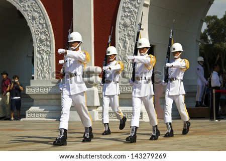 TAIPEI, TAIWAN-JUNE 8,2013: Taiwan honor guard in handing-over ceremony at National Revolutionary Martyrs\' Shrine on JUNE 8,2013 in Taipei,Taiwan