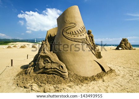 FULONG, TAIWAN-JUNE 19,2013:a novel sand sculpture at Fulong beach for celebrating the Sand Sculpture Festival on JUNE 19,2013 in Fulong,Taiwan