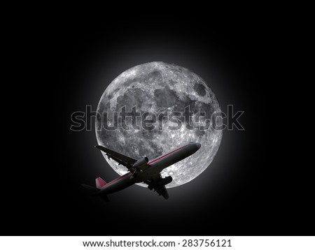 an airplane flying across a full moon