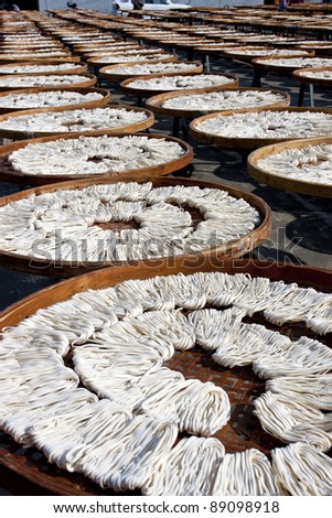 detail view of noodles under fabricate on sunbath at Guan Temple in Tainan,2011 in Taiwan