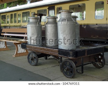 Vintage milk churns on railway platform