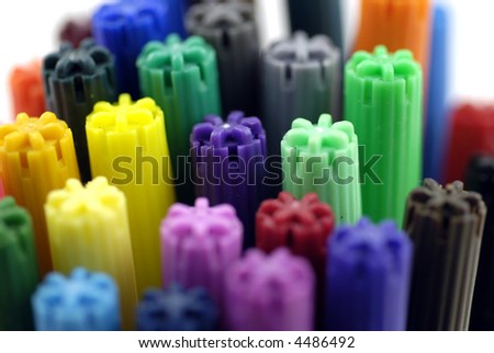 colorful pen caps; differential focus
