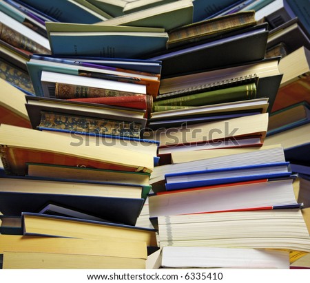 overwhelming piles of books