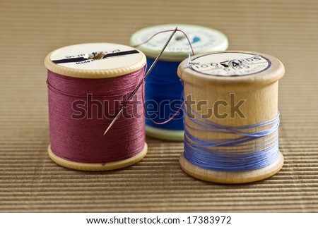 traditional cotton reel with needle
