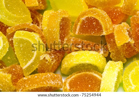 Random background of jelly candy orange and lemon slice shapes