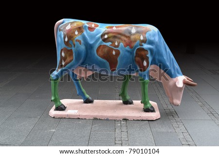 Earth painted cow statue