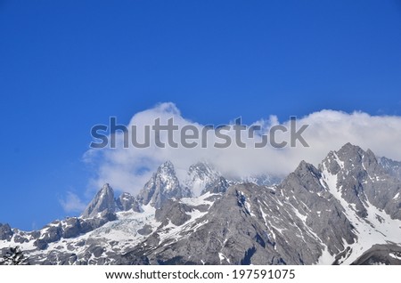 Snow Mountain Peak in the Clouds