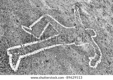 outline of man\'s body on the ground