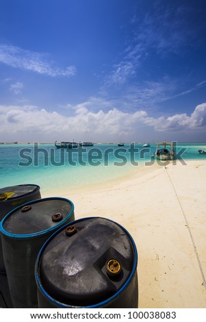 Barrels for petrol, oil, diesel for boats or ships at the beach