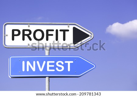 blue sky behind two white and blue road signs  on a metal mast with arrows to the right hand side showing the way to profit and invest