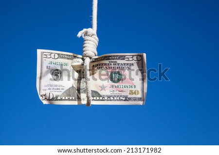 one fifty Dollar banknote hanging in the air at a  gibbet cord: Concept for Dollar crisis, financial benefit or trap