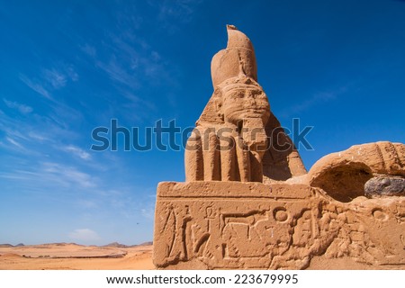 ancient Sphinx near temple Wadi El Seboua in front of the Sahara desert, Lake Nasser, southern Egypt, Africa. The temple was rescued from flooding Nasser lake and can be reached  by ship only.