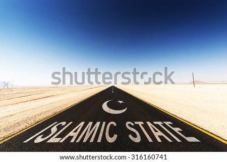 black tar road in the desert with the words Islamic State and a arabic half moon and star on the asphalt.