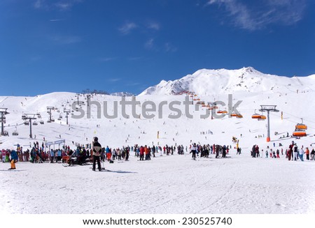 SOLDEN, TIROL, AUSTRIA - MARCH 10, 2013: Crowd of skiers and chairlifts in Alpine ski resort in Solden in Otztal Alps, Tirol, Austria